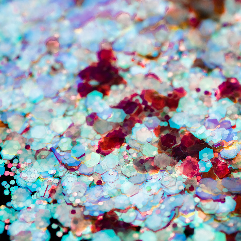 A photo of Ariel Chunky Glitter by DreamSQNS scattered in different lighting