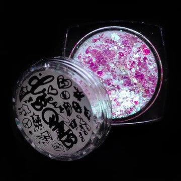 A photo of Ariel Glitter Paste by DreamSQNS, in its component on a black background
