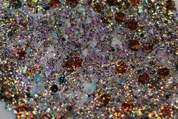 A swatch image of Kryptonite Glitter Paste from DreamSQNS on a white background