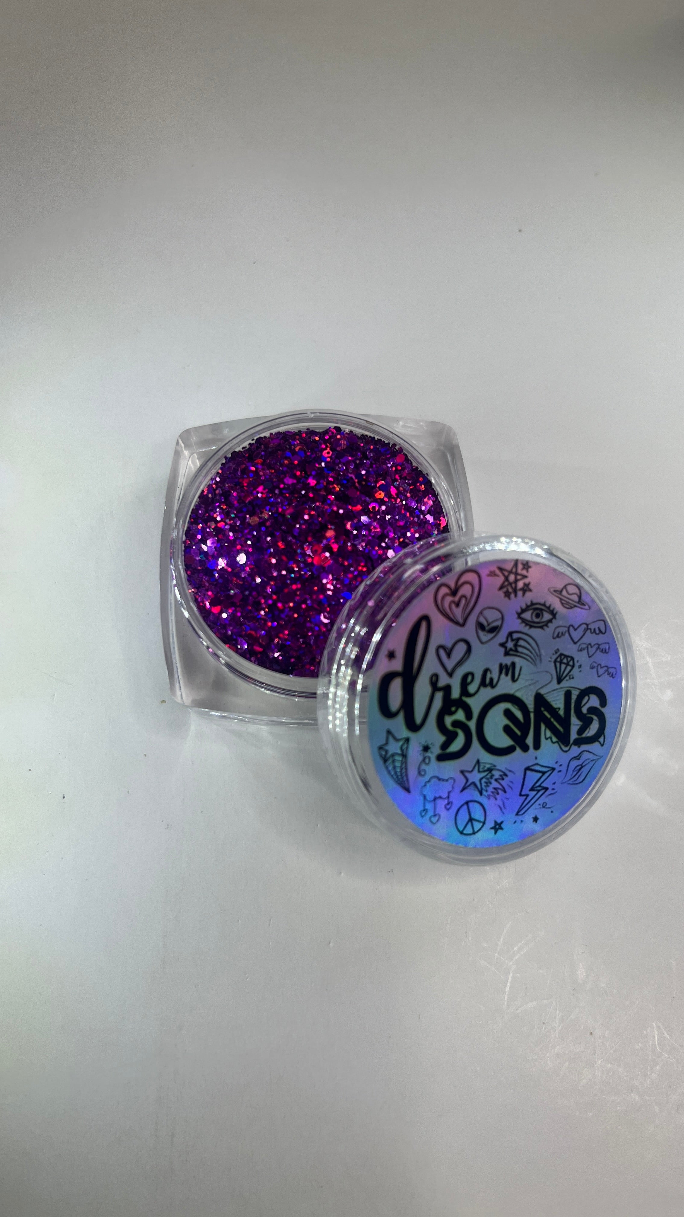 Top view of ‘Purple Rain’ Holographic Glitter by DreamSQNS in the component with lid