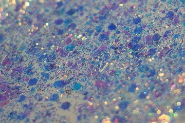 Silver Lining Glitter Paste from DreamSQNS spread out on a white platform