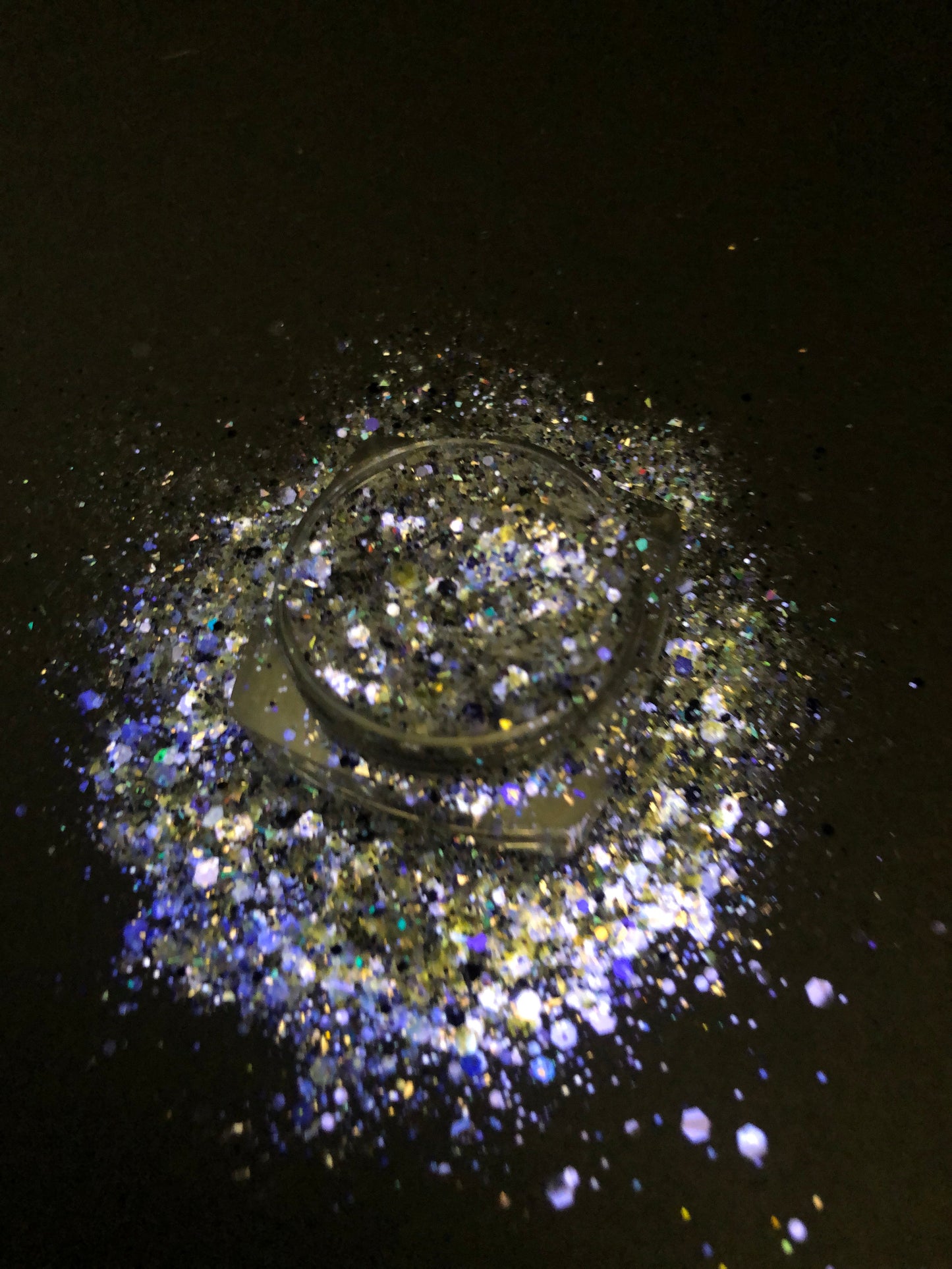 A top view image of Spellbound Chunky Glitter by DreamSQNS on a black surface