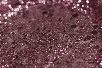 An image of Turkish Delight Glitter Paste from DreamSQNS spread out on a white surface