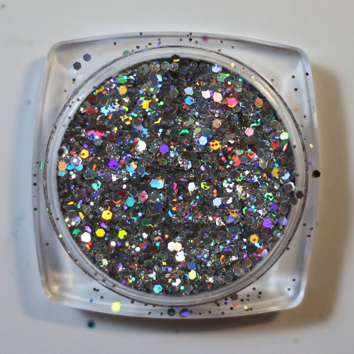 A top view image of Unicorn Holographic Glitter by DreamSQNS in the pot