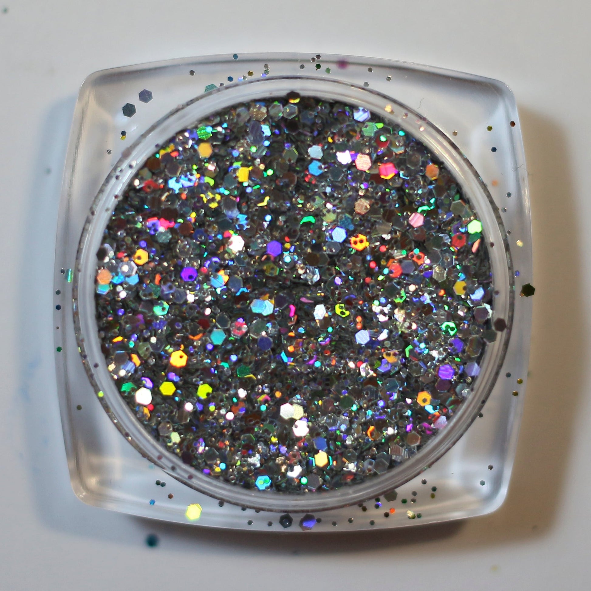 A top view image of Unicorn Holographic Glitter by DreamSQNS in the pot