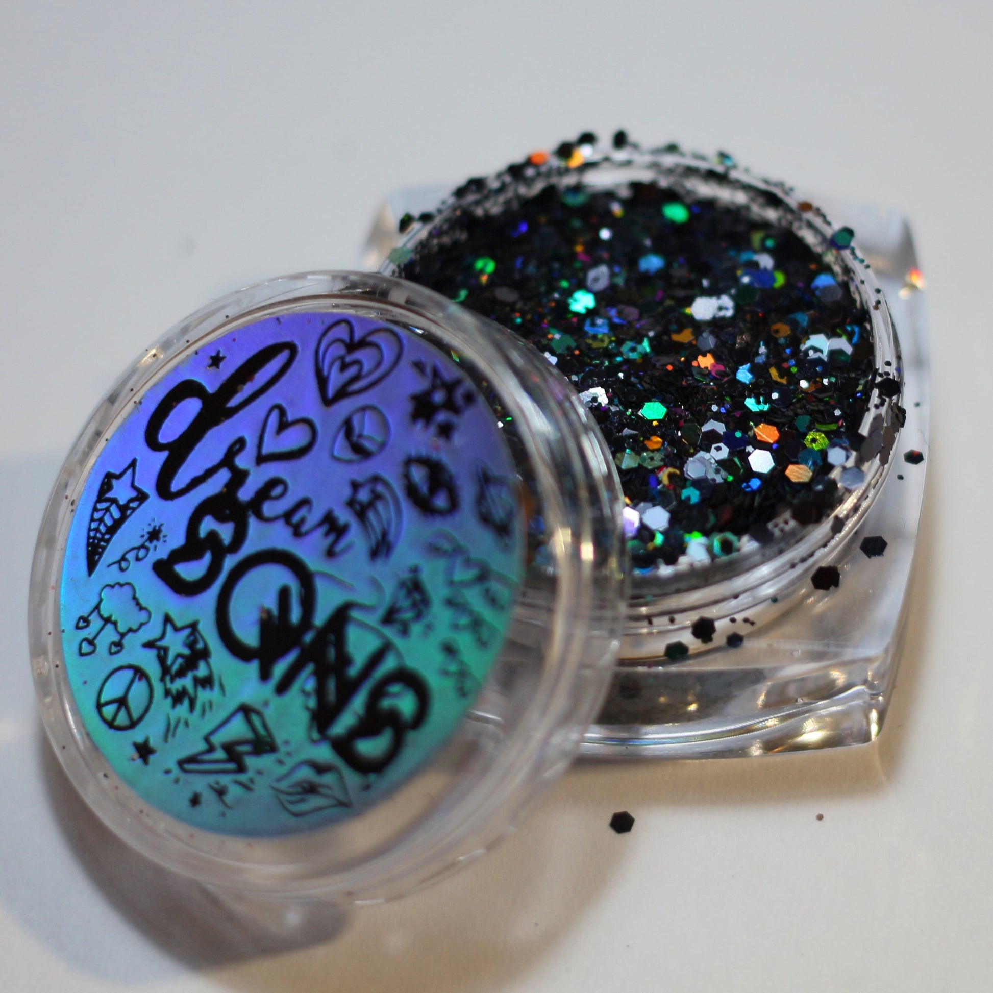 An image of Black Magic Holographic Glitter from DreamSQNS in the branded component