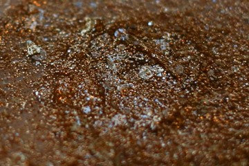 Champagne Showers Glitter Paste by DreamSQNS spread on a white surface